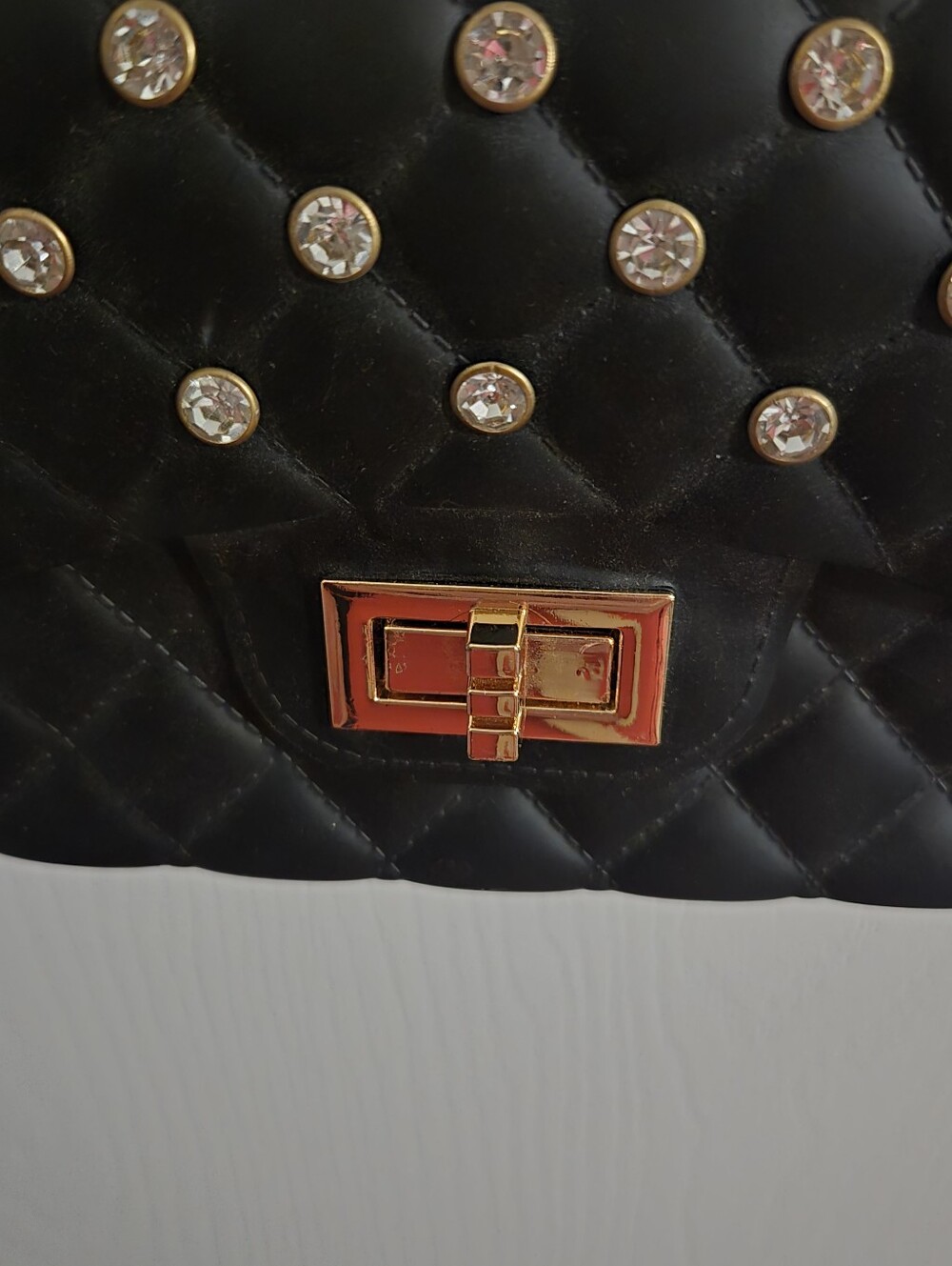 Black Quilted Crossbody Bag with Gold Turn-Lock and Crystal Studs